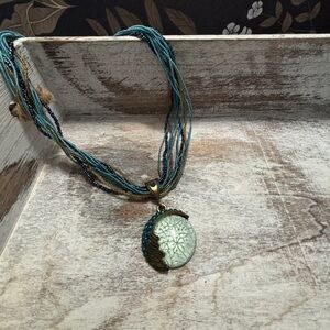 Whimsical teal blue aqua medallion charm pendant multi strands necklace